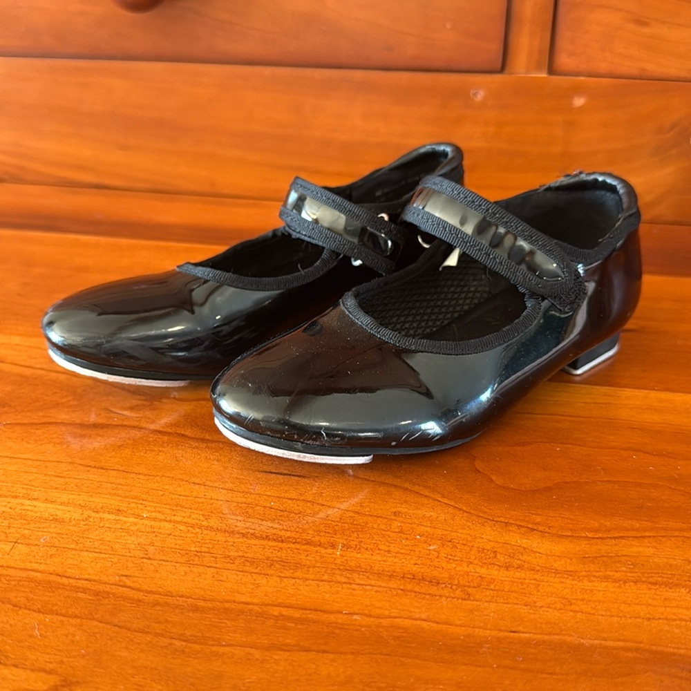 Black patent tap dance shoes